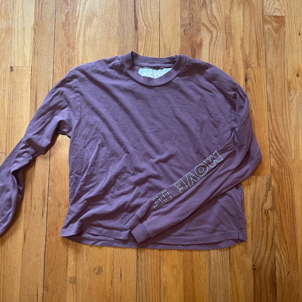Mother moves tee